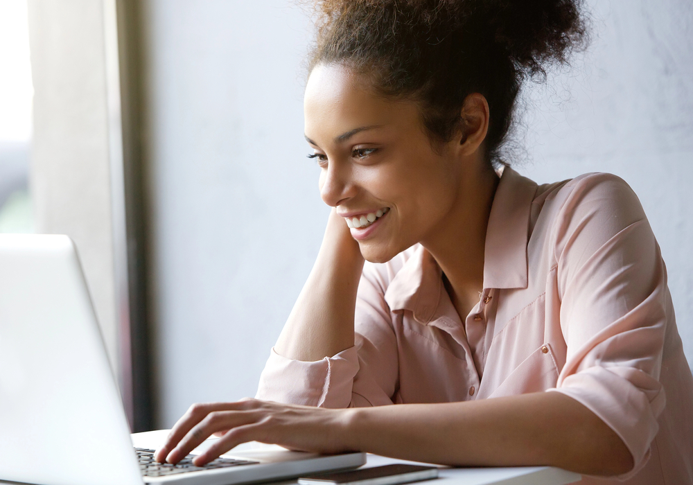 woman on laptop trying to connect with clients