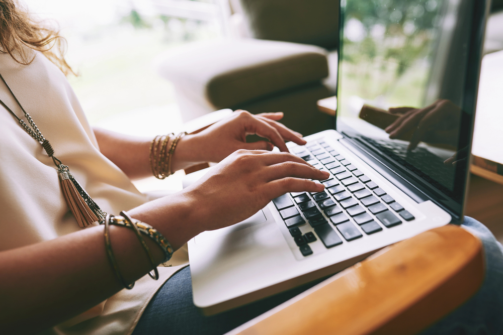 Learning how to write while typing on a laptop