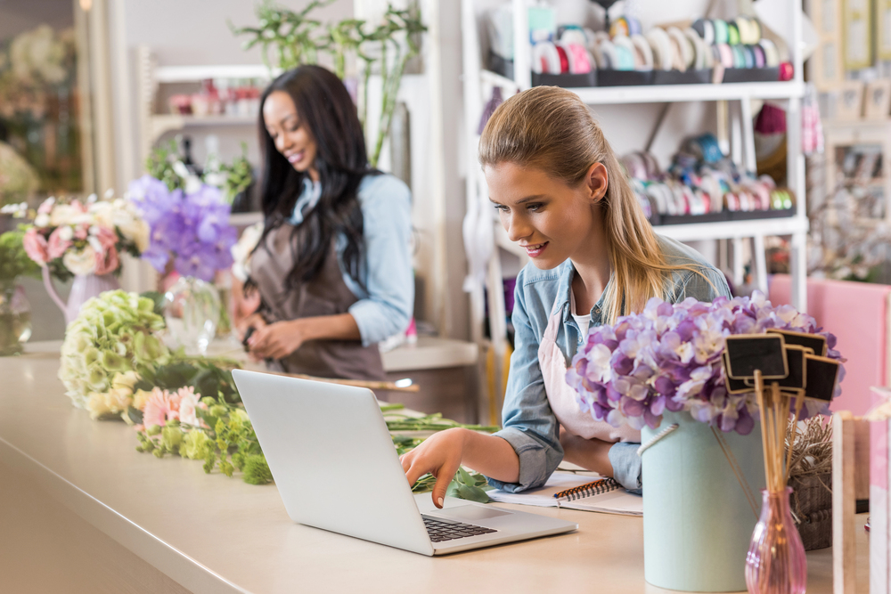 Women working at floral counter