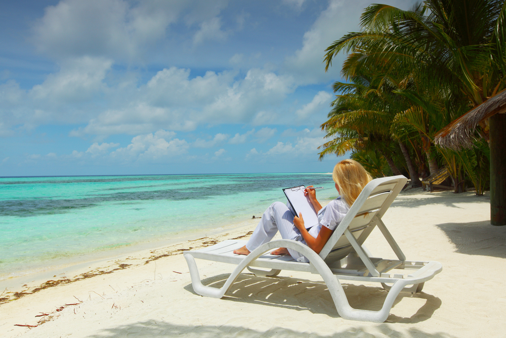woman working on the beach